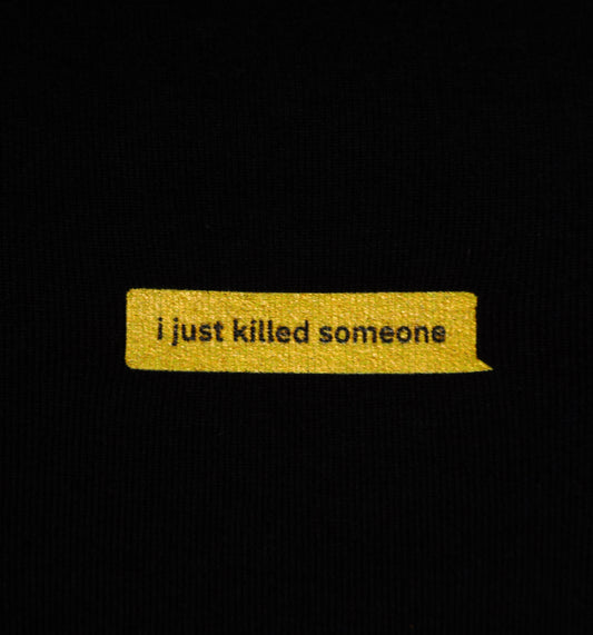 Yellow text strip with 'i just killed someone' on a black background